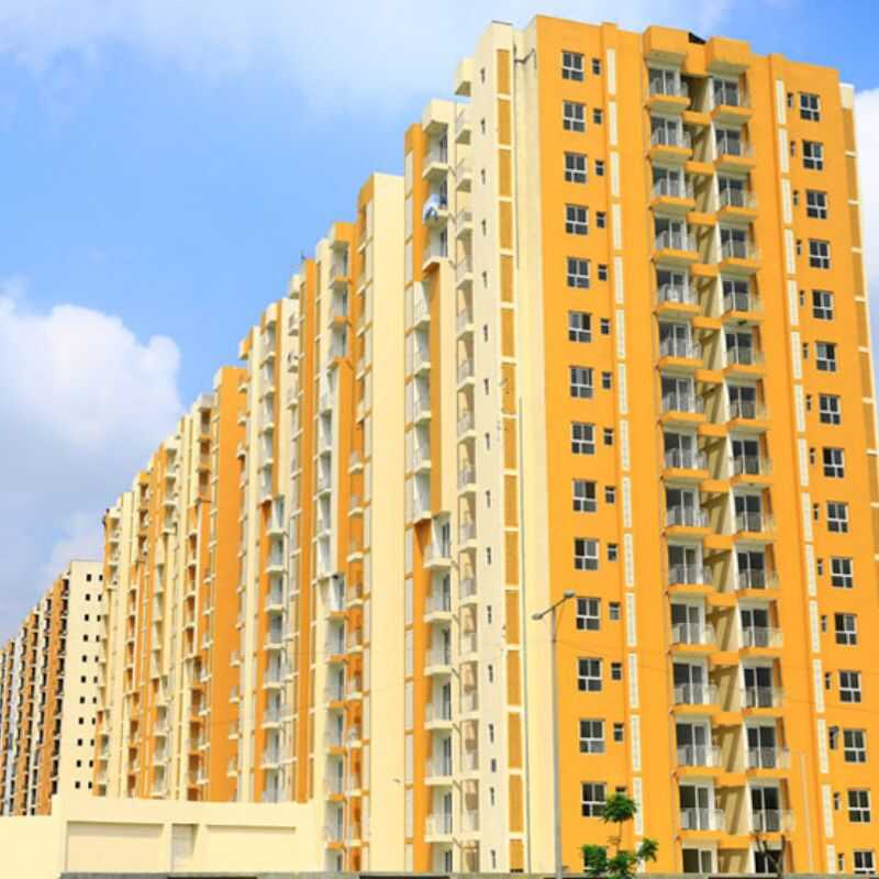 Row of Wave Dream Homes buildings showing scale and architectural pattern