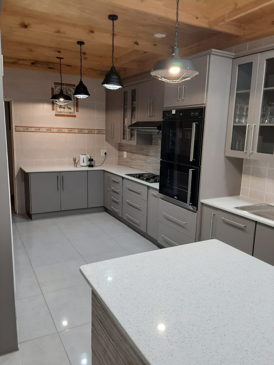 Grey Kitchen with Wood Ceiling