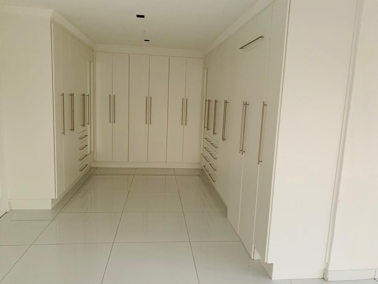 White Walk-In Closet