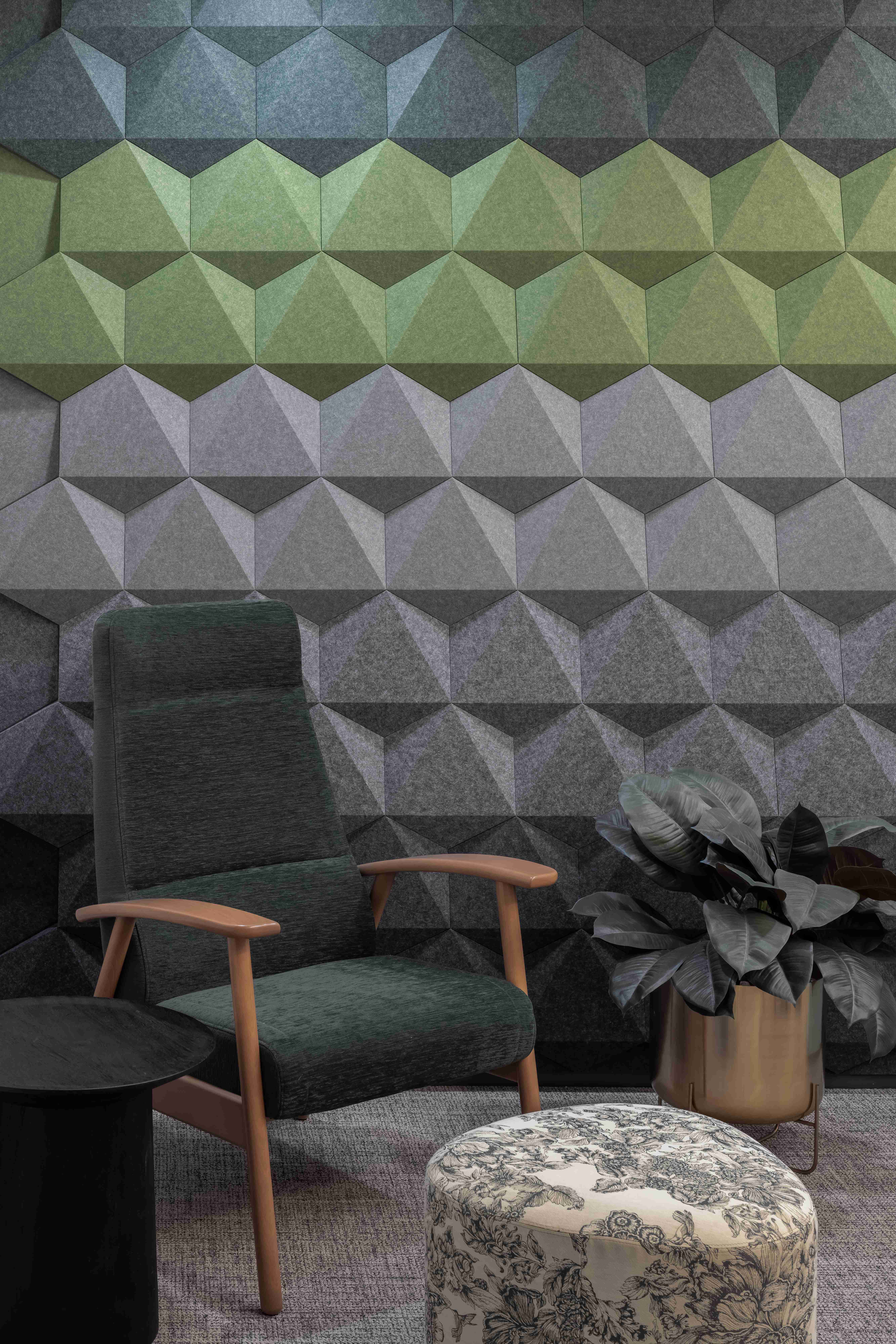 Acoustic design showcase featuring geometric wall panels and modern furniture