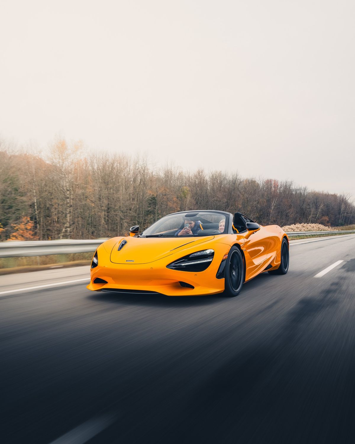 Orange McLaren 720S Spider in motion