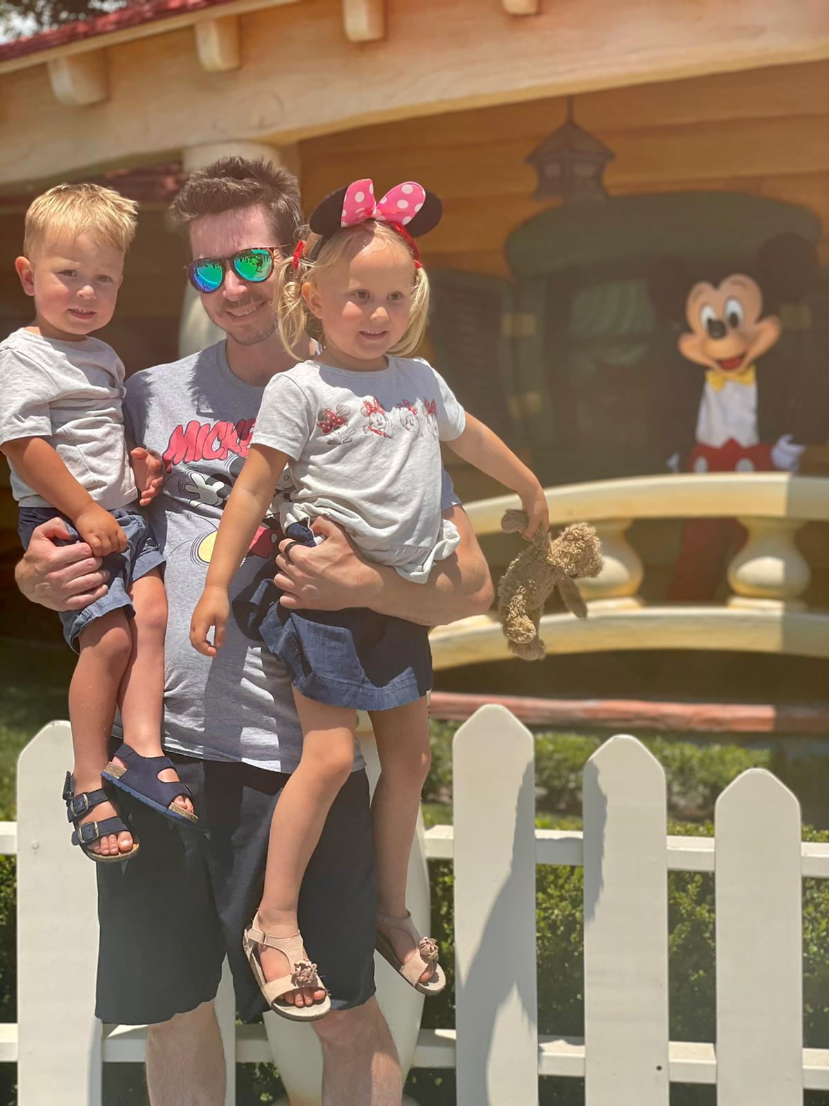 David with kids at theme park