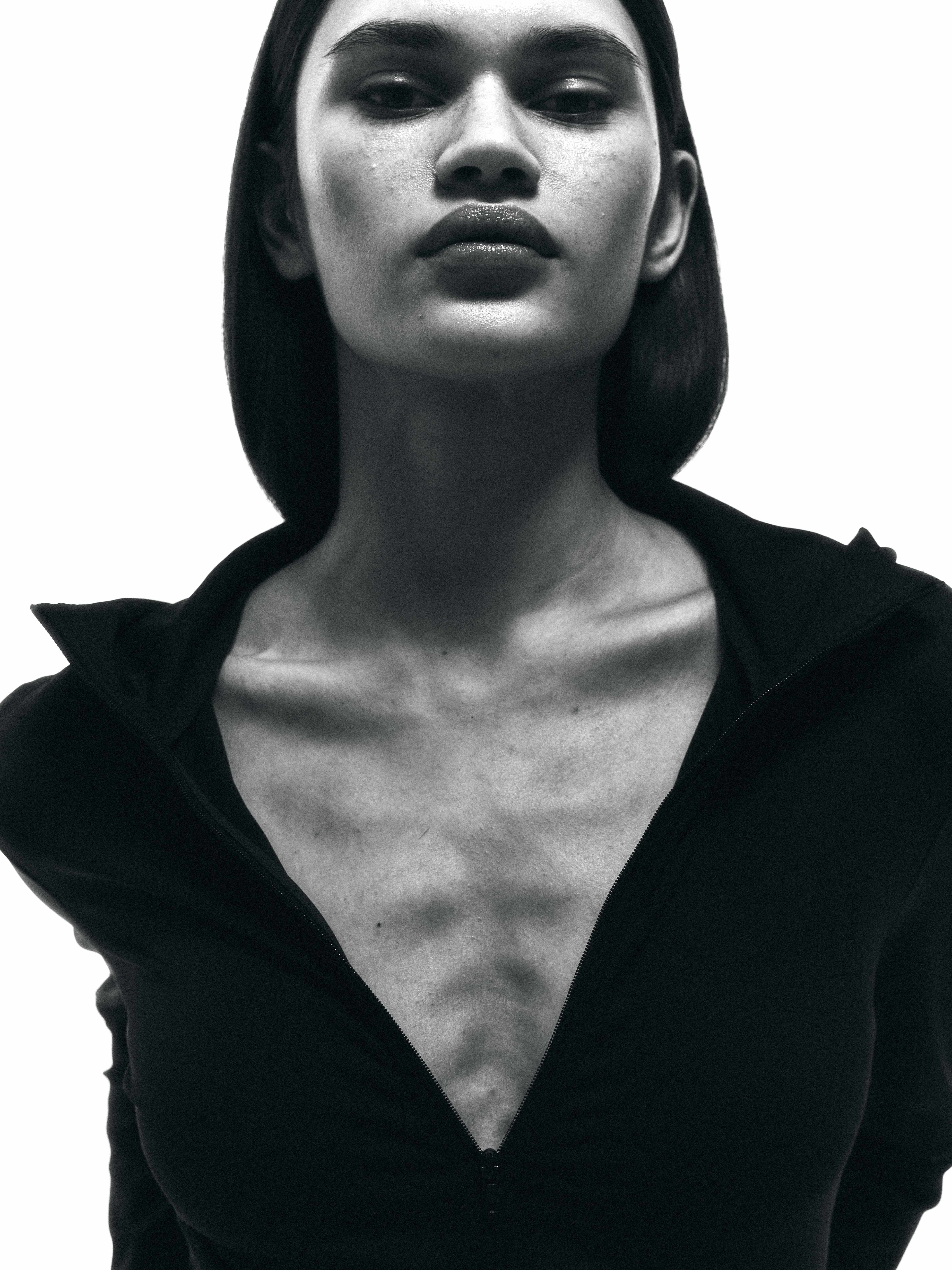 Editorial B&W before retouching — strong contrast, natural skin texture