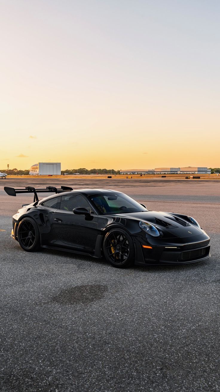 Black Porsche GT3 RS at sunset