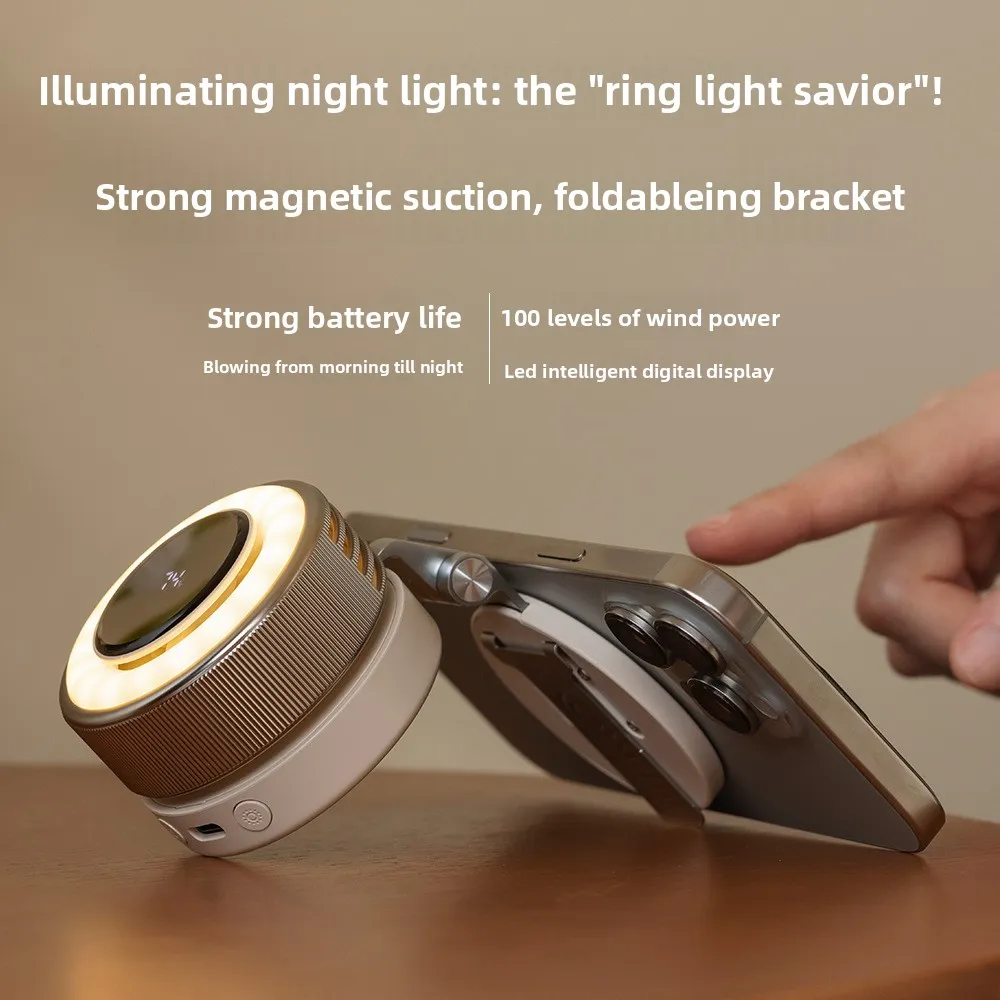 AURA ONE glowing with a warm ring light while magnetically holding an iPhone upright on a wooden table