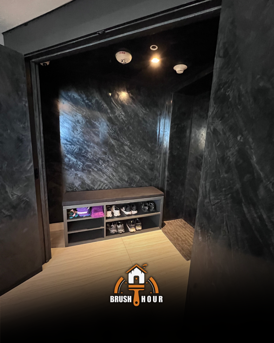 Dark textured entry with shoe storage