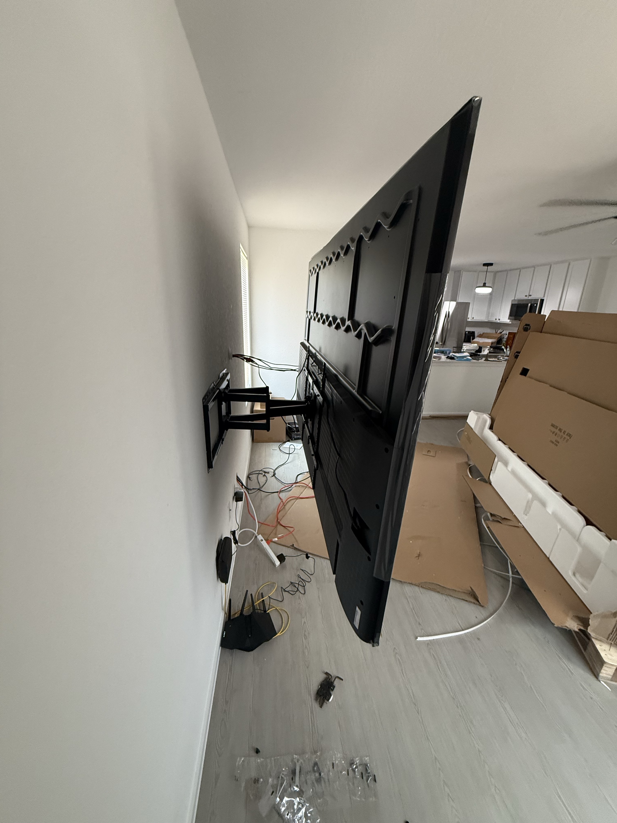 Large TV wall mounting installation