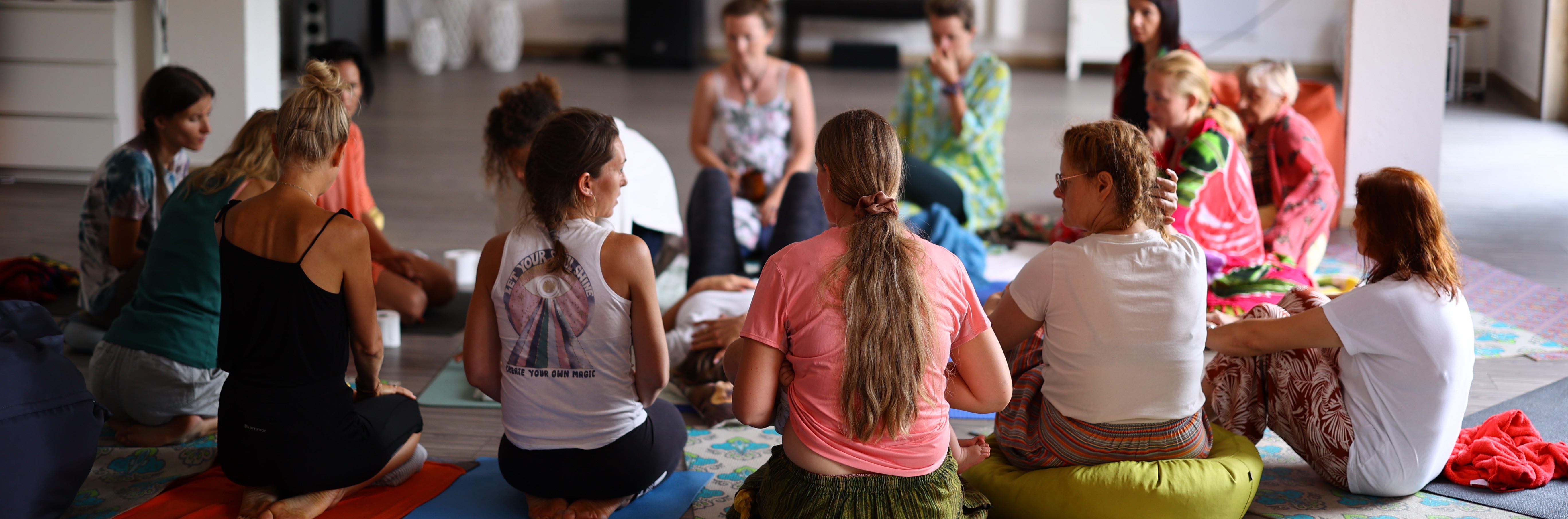 Group of women in circle during retreat workshop