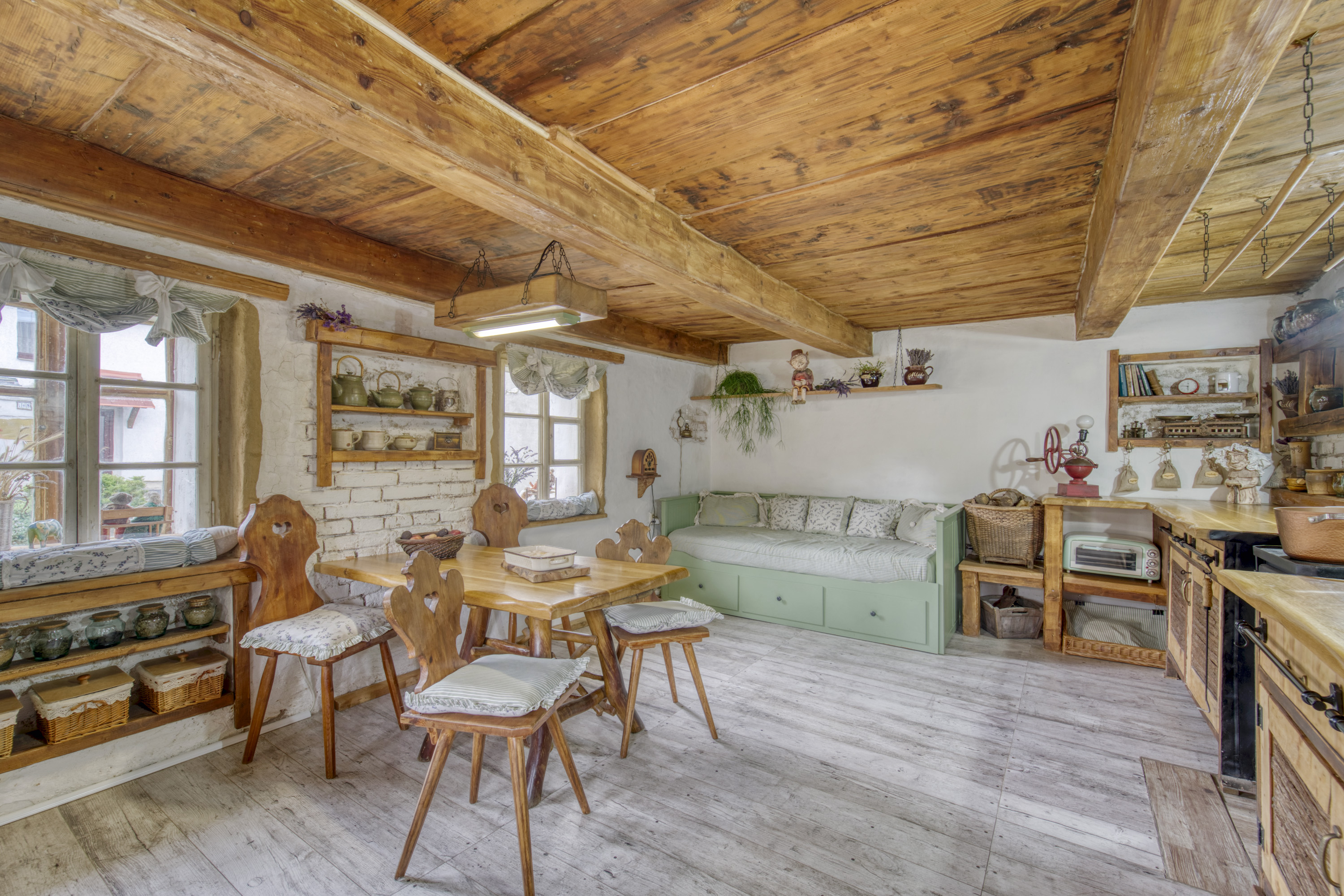 Rustic dining room with exposed timber ceiling