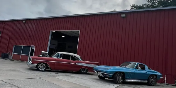 Classic cars outside the Aftermath Hot Rods shop in Venice, Florida