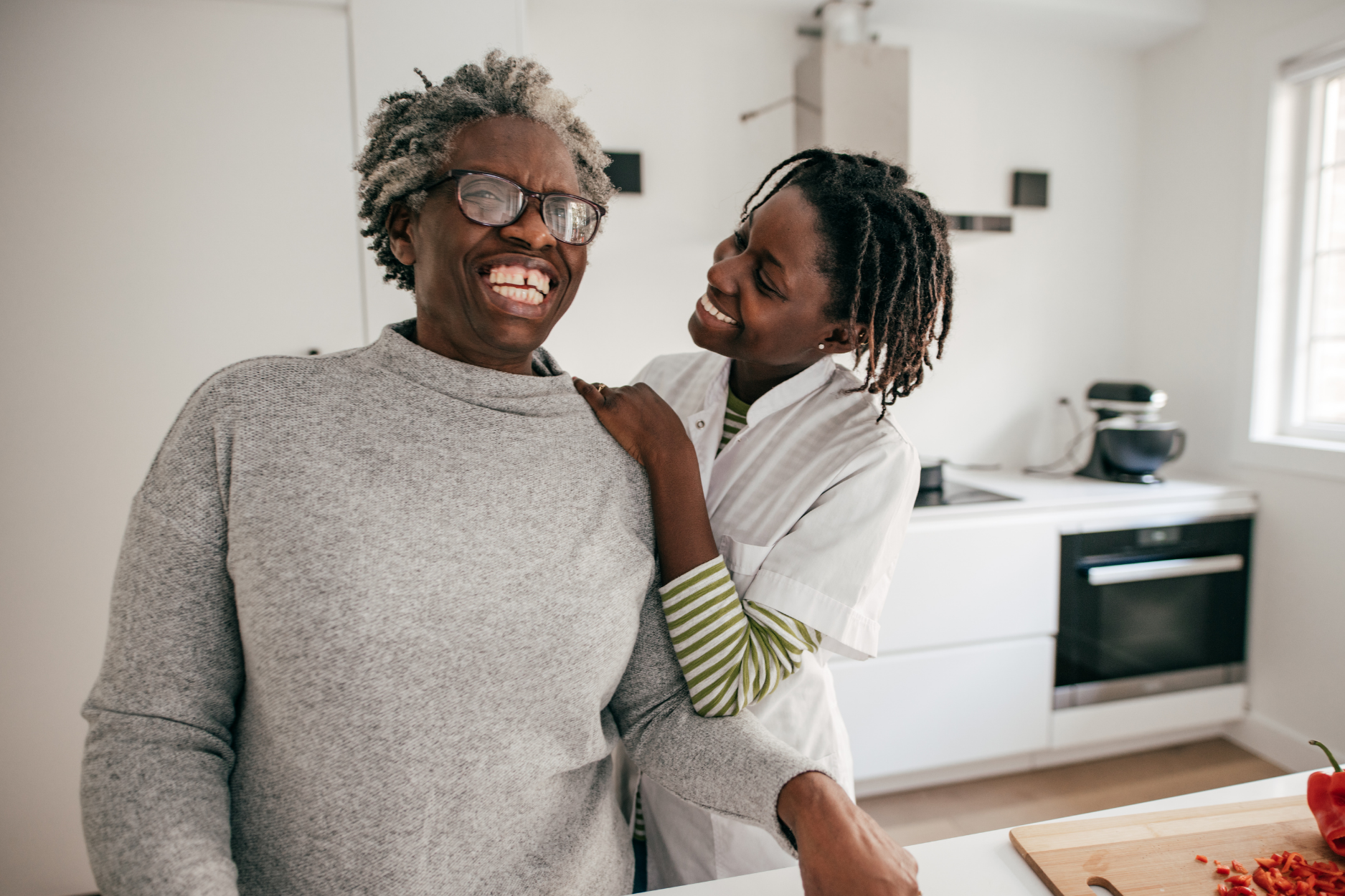 Caregiver and patient in kitchen
