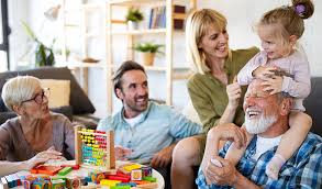 Multi-generational family playing together indoors