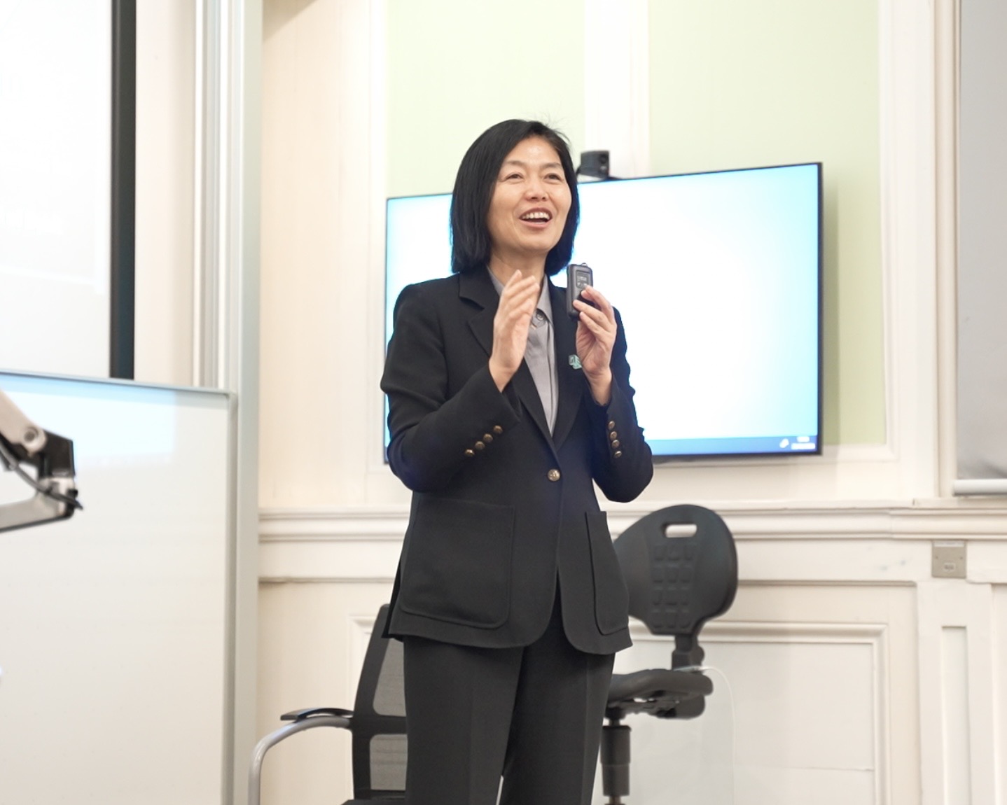 Helen Liu laughing during presentation
