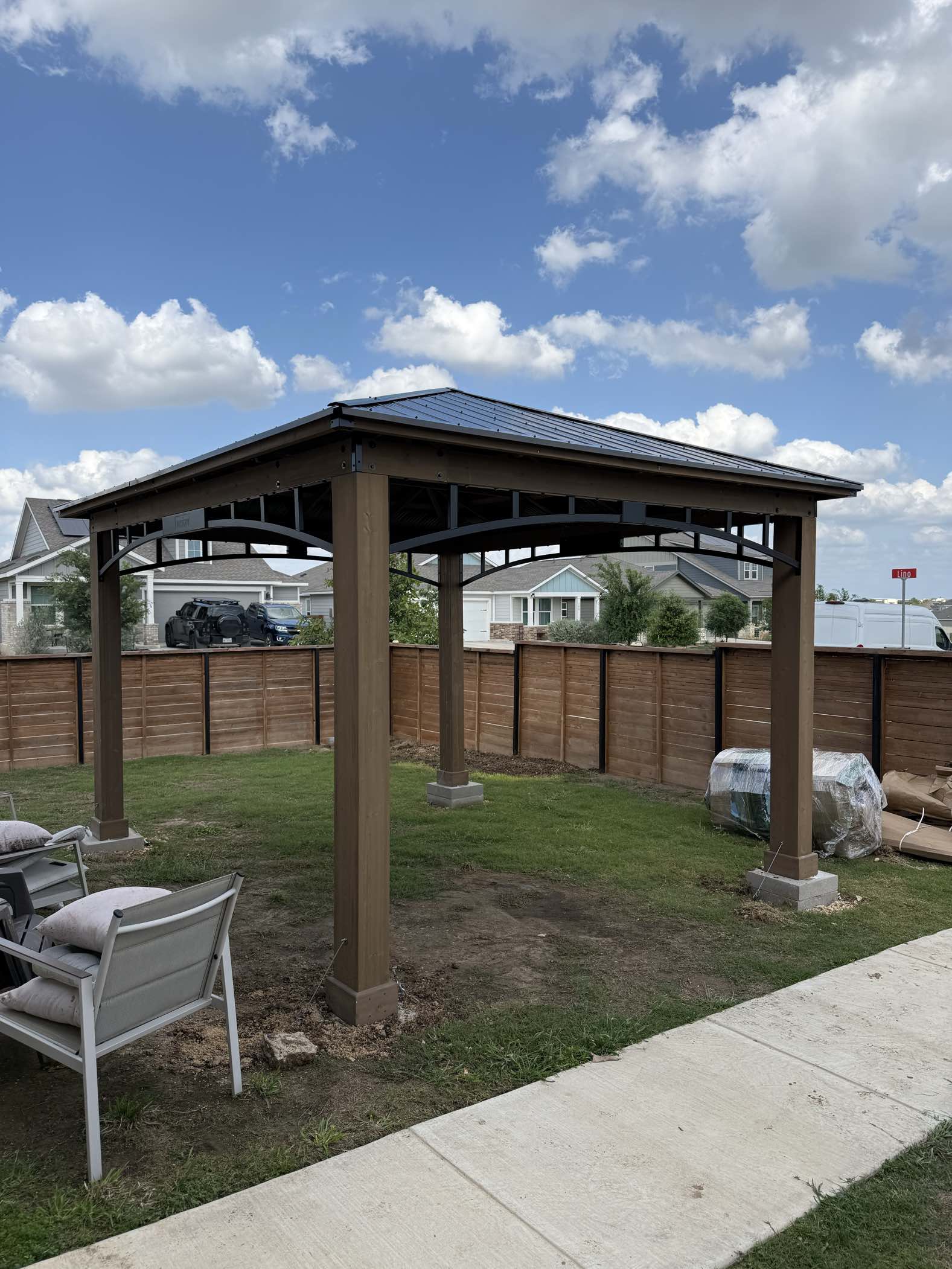 Completed gazebo installation in backyard
