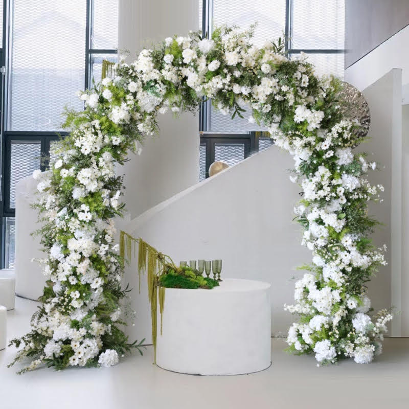 Elegant white floral arch