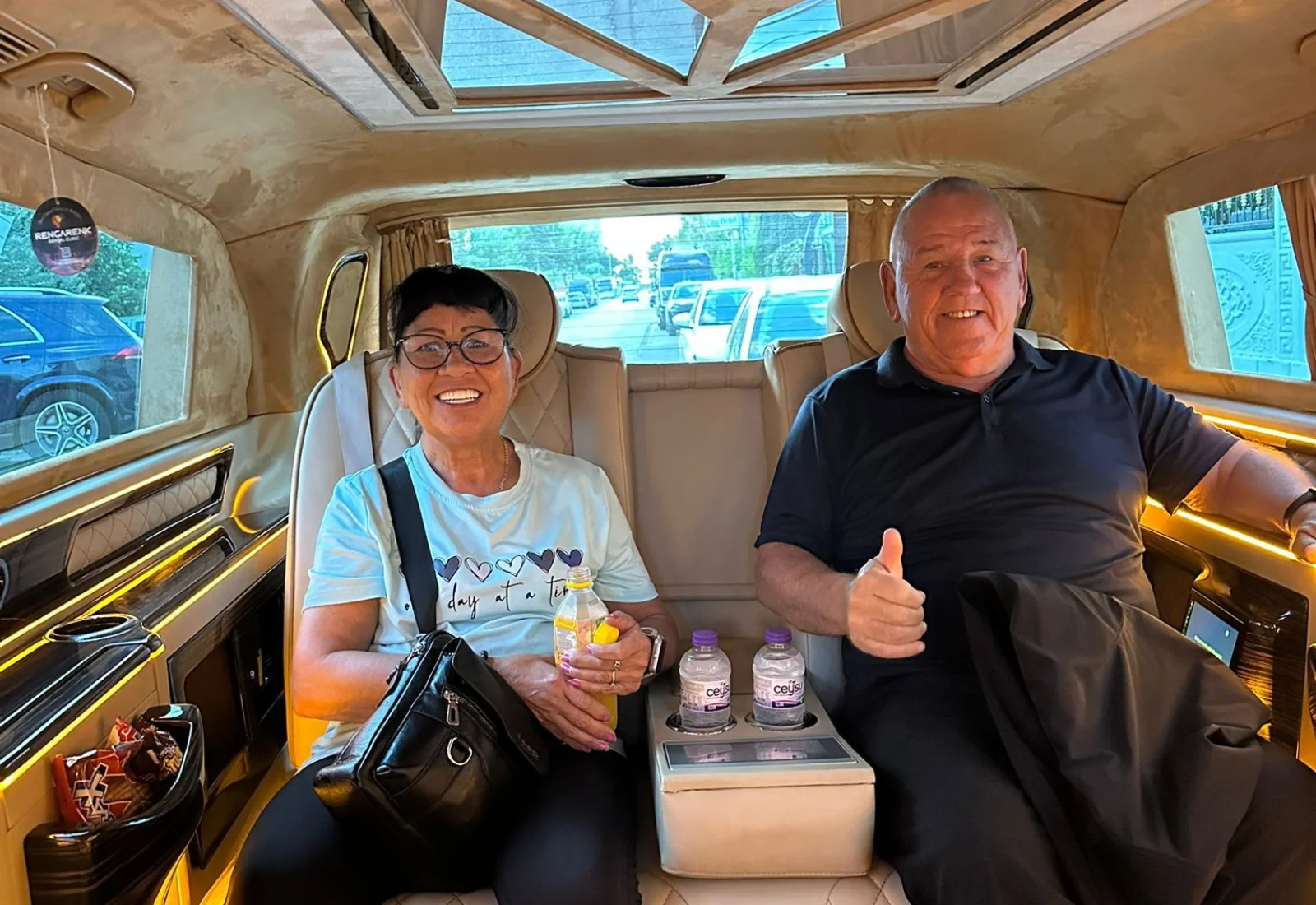 Happy couple enjoying VIP transfer