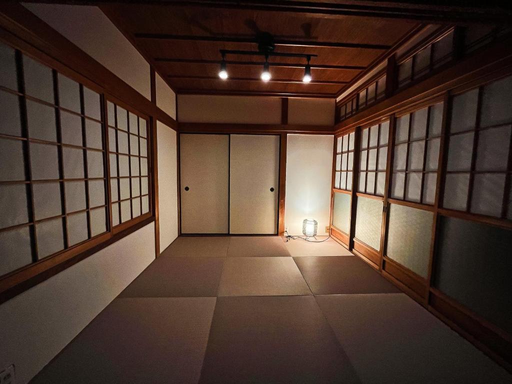 Spacious tatami room with ambient lighting