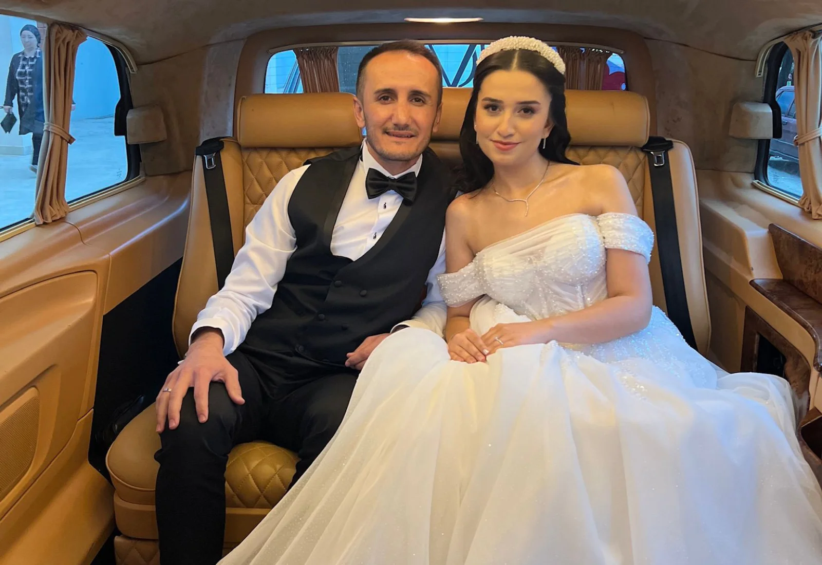 Wedding couple in luxury transfer