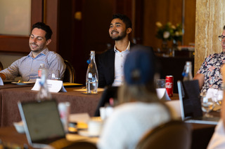 Attendees engaged in discussion