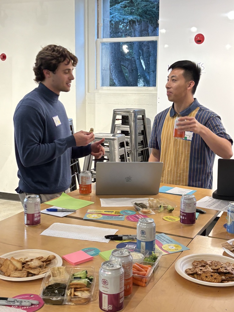 Participants networking over food and conversation