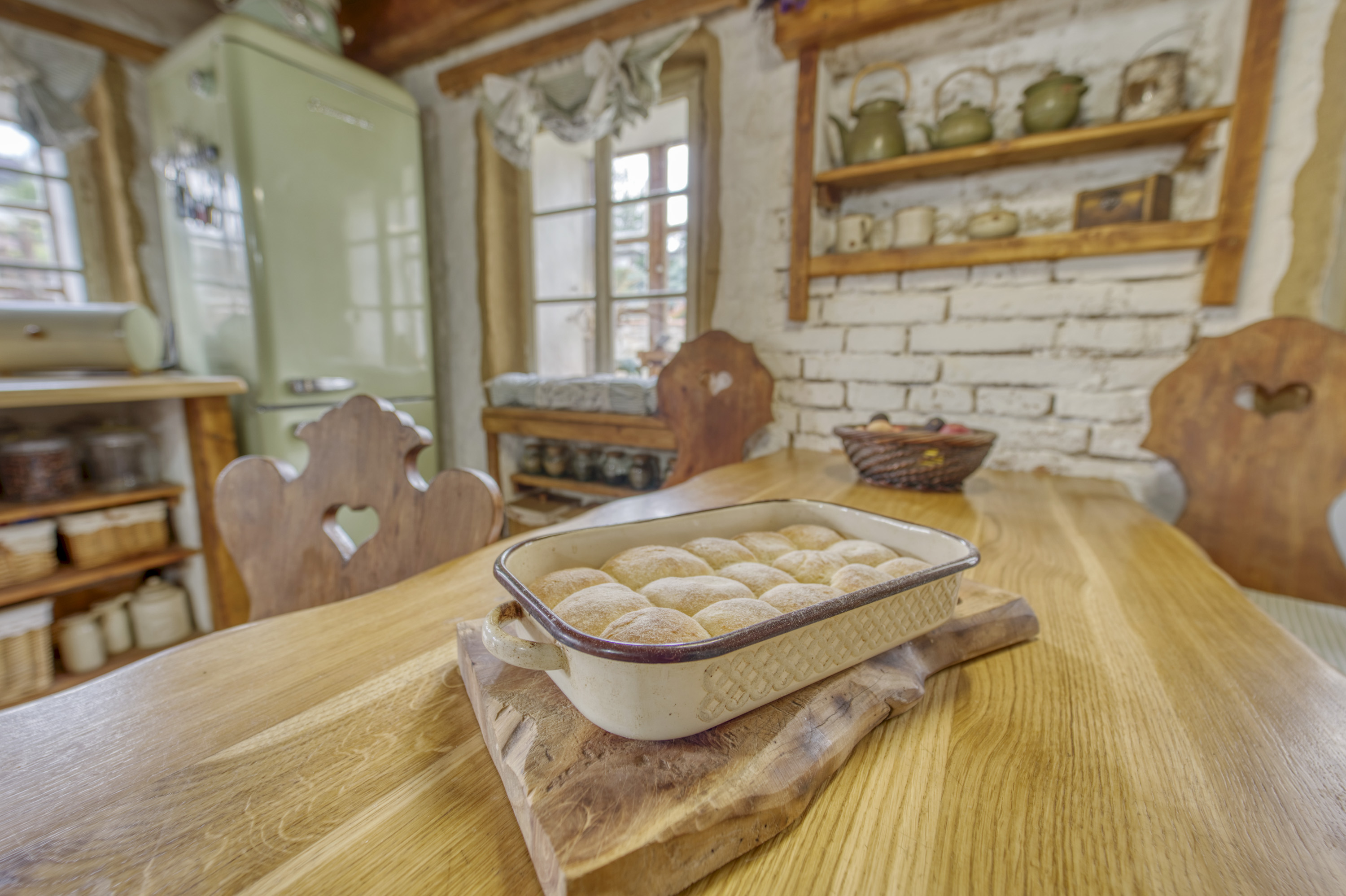 Rustic kitchen dining table with freshly baked bread
