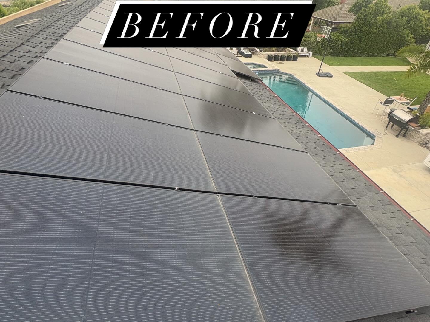 Before cleaning - dirty solar panels with pool view