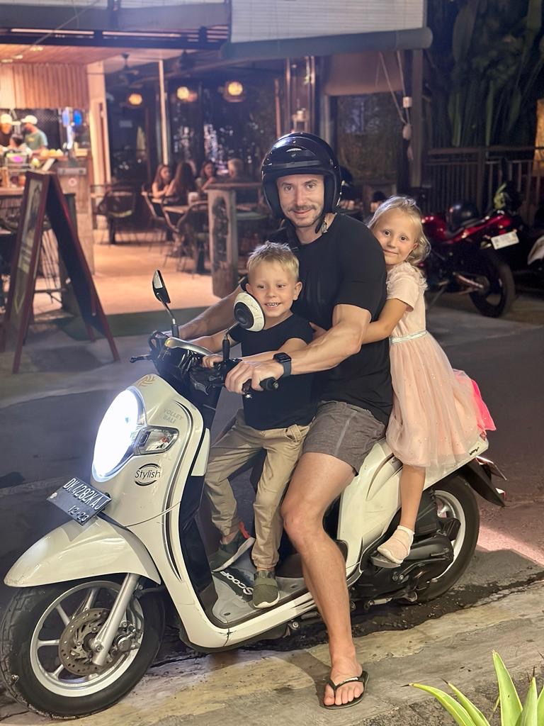 David and kids on a scooter