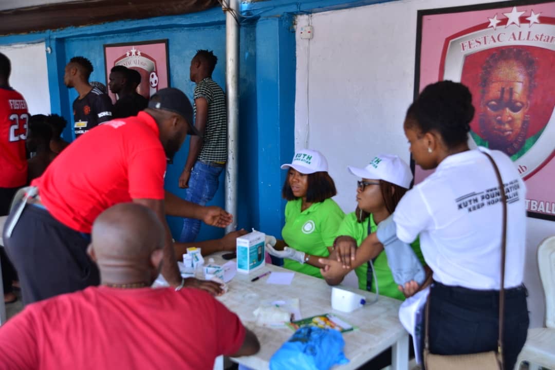 KUTH team serving football players and community members