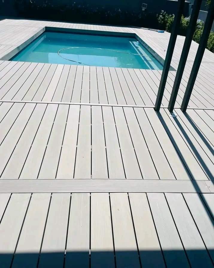 Pool deck with composite decking