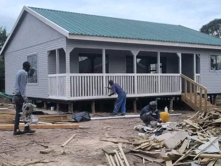 Nutec house under construction with wraparound porch
