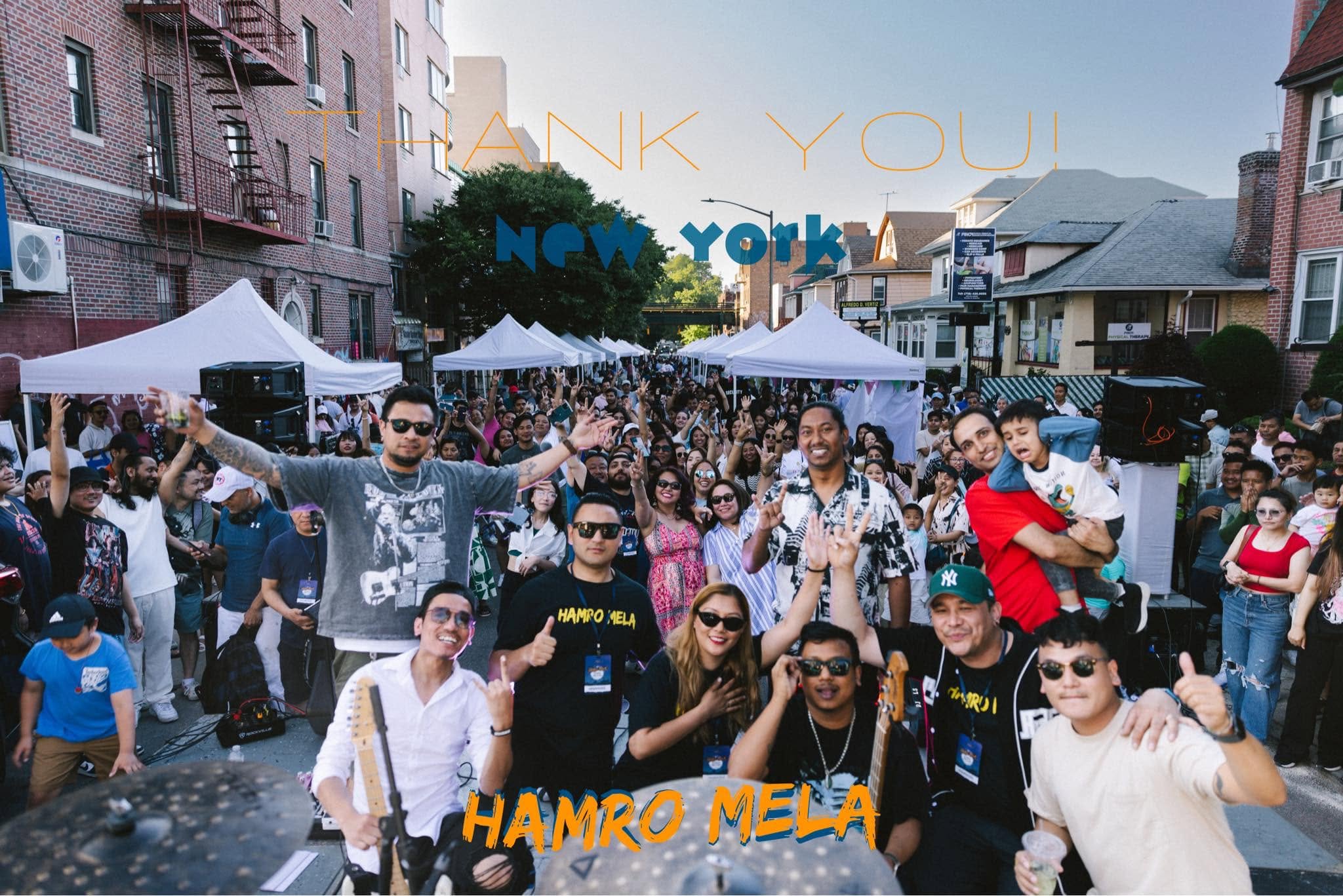 Hamro Mela performers and crowd celebrating on 76th Street, Jackson Heights