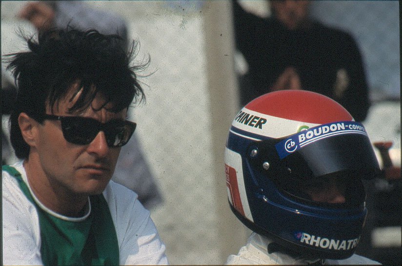 Young Christian Boudon trackside with a driver wearing Boudon-Competition helmet