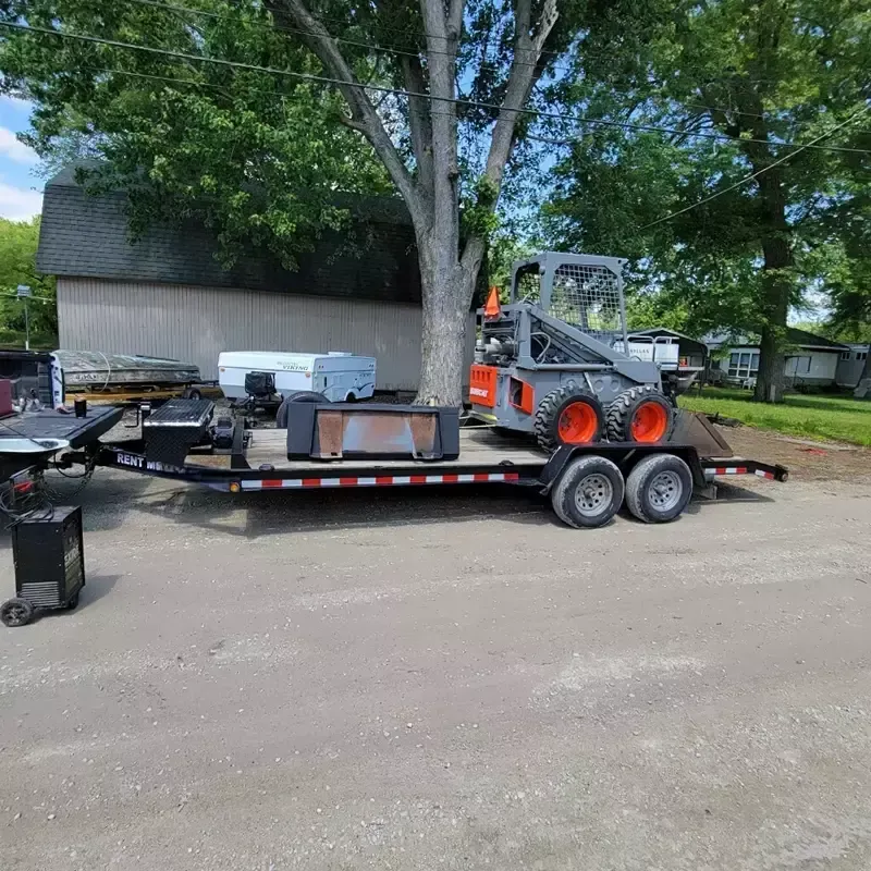 Car hauler trailer parked on driveway