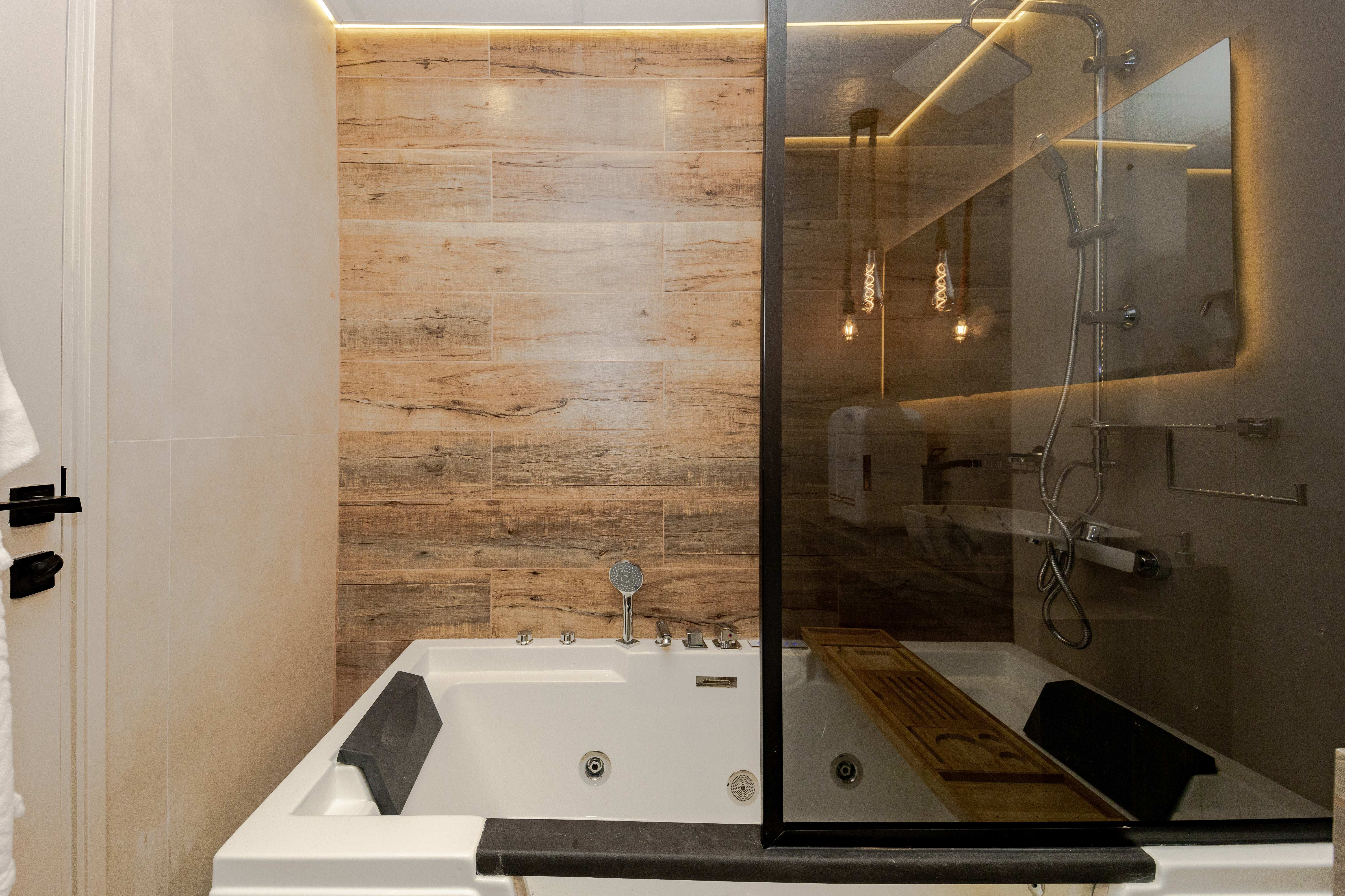 Bathroom with wood-look tile and jacuzzi tub