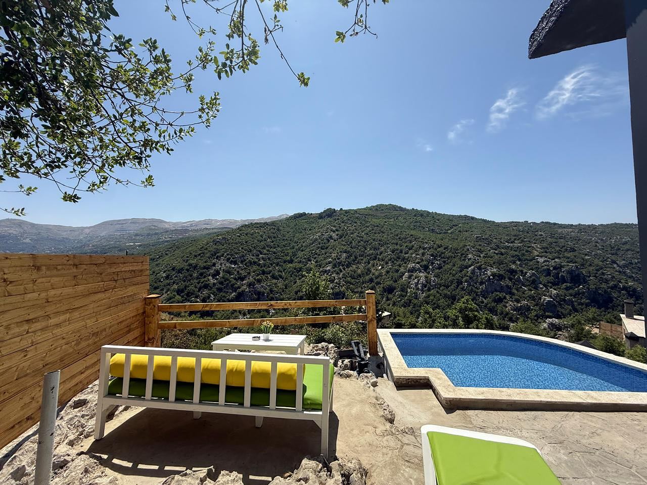 Outdoor seating area with mountain view