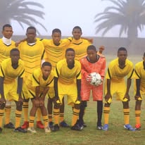 Liberator FC team in yellow jerseys