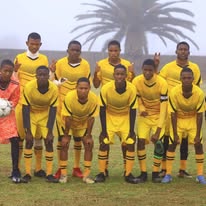 Liberator FC team in yellow jerseys group photo