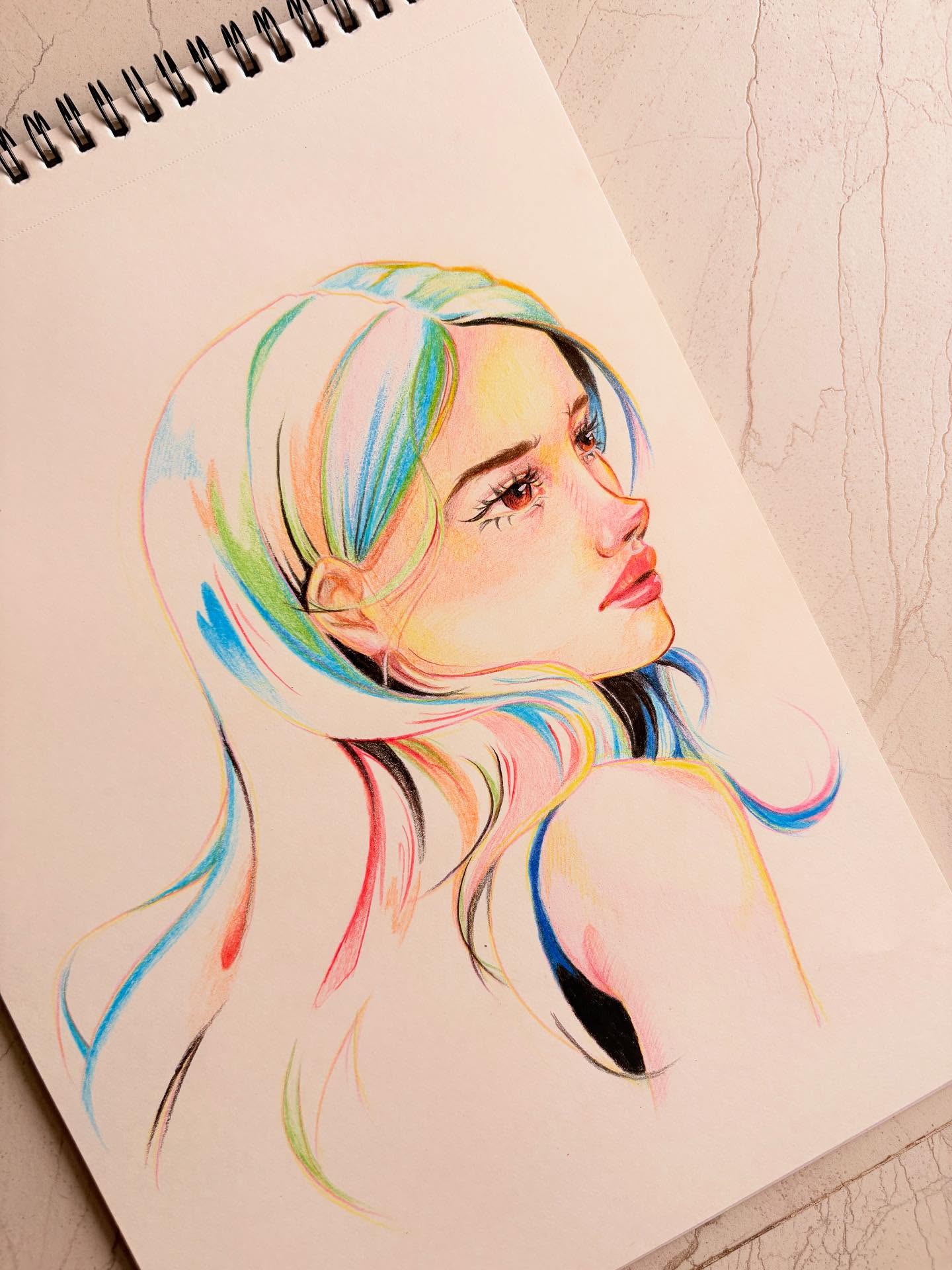 Colored pencil portrait with multicolored hair, side profile