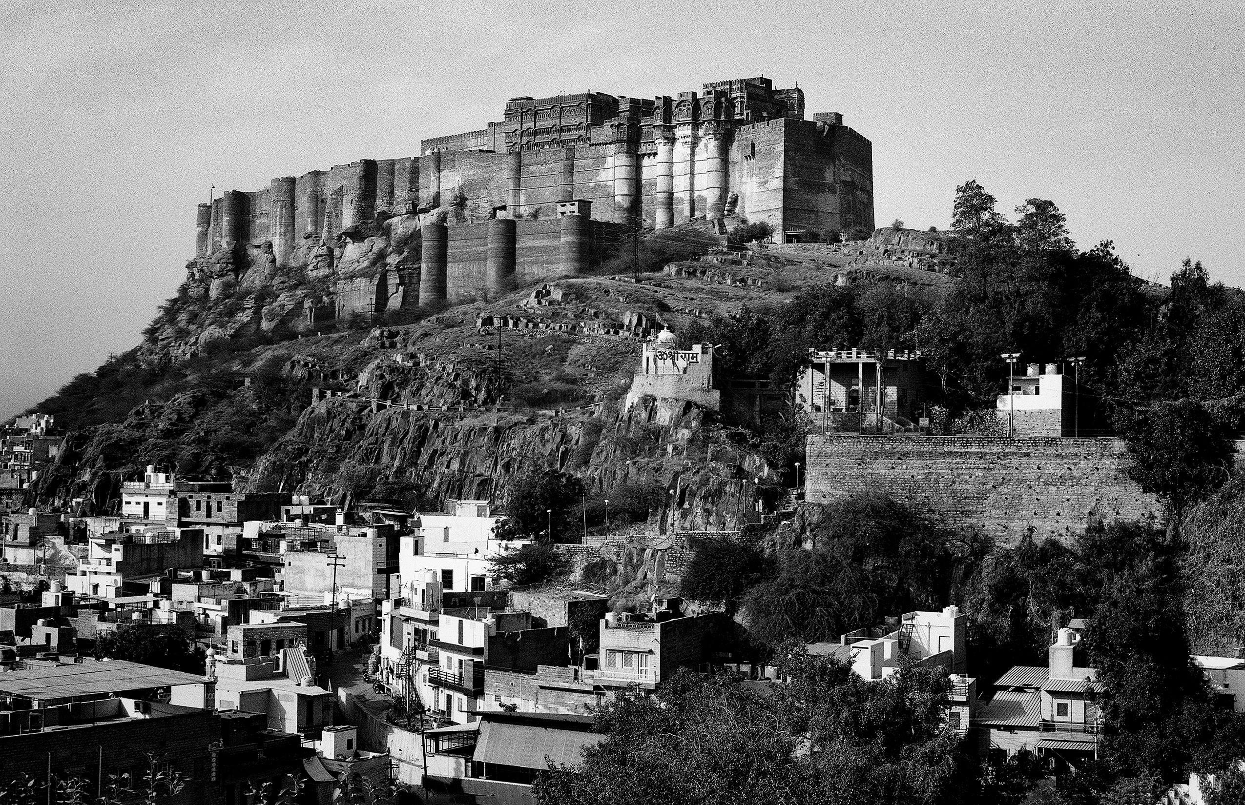 Mehrangarh Fort in Jodhpur rising above dense cityscape