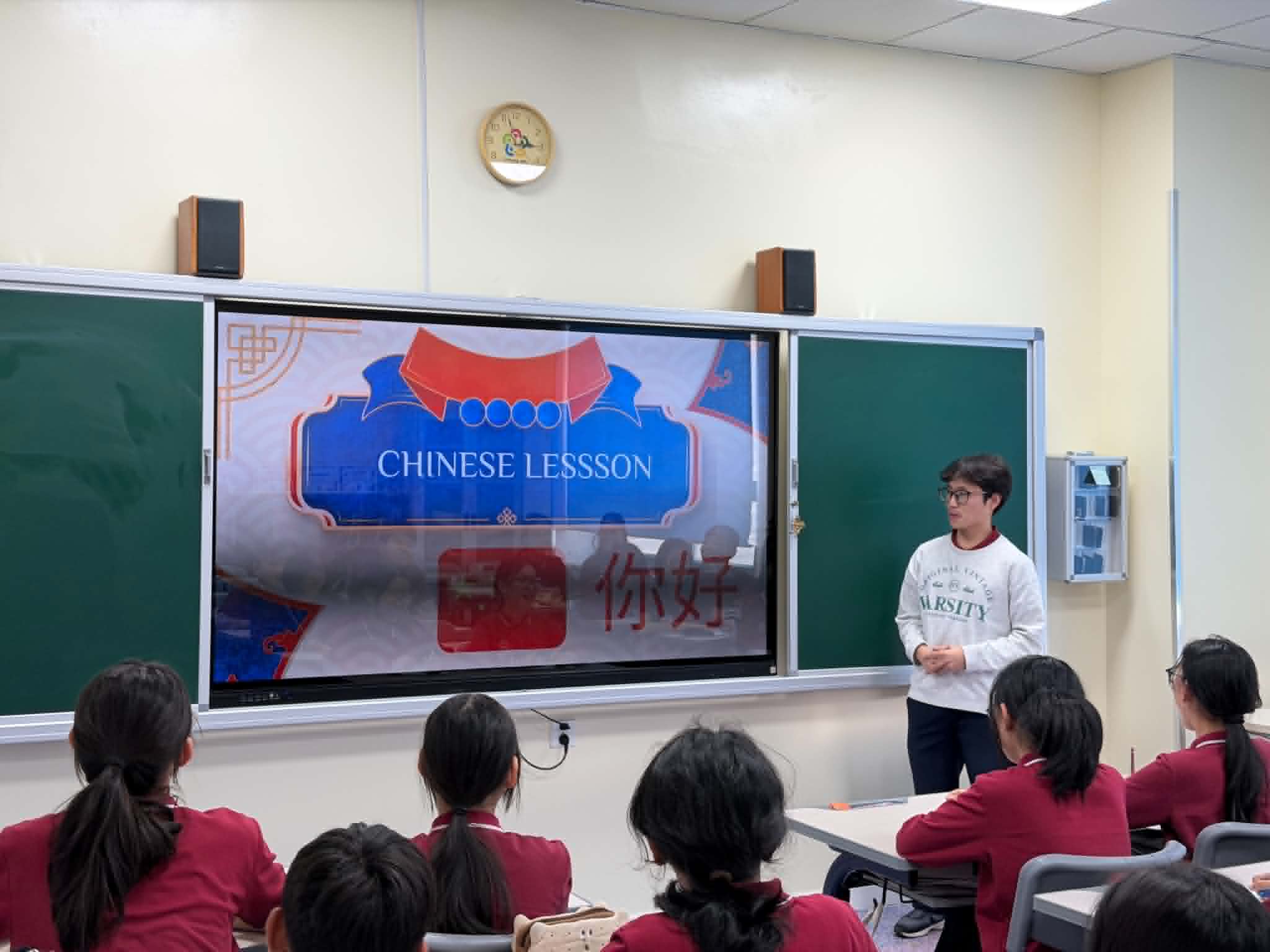 Erkhembold teaching a Chinese lesson in classroom