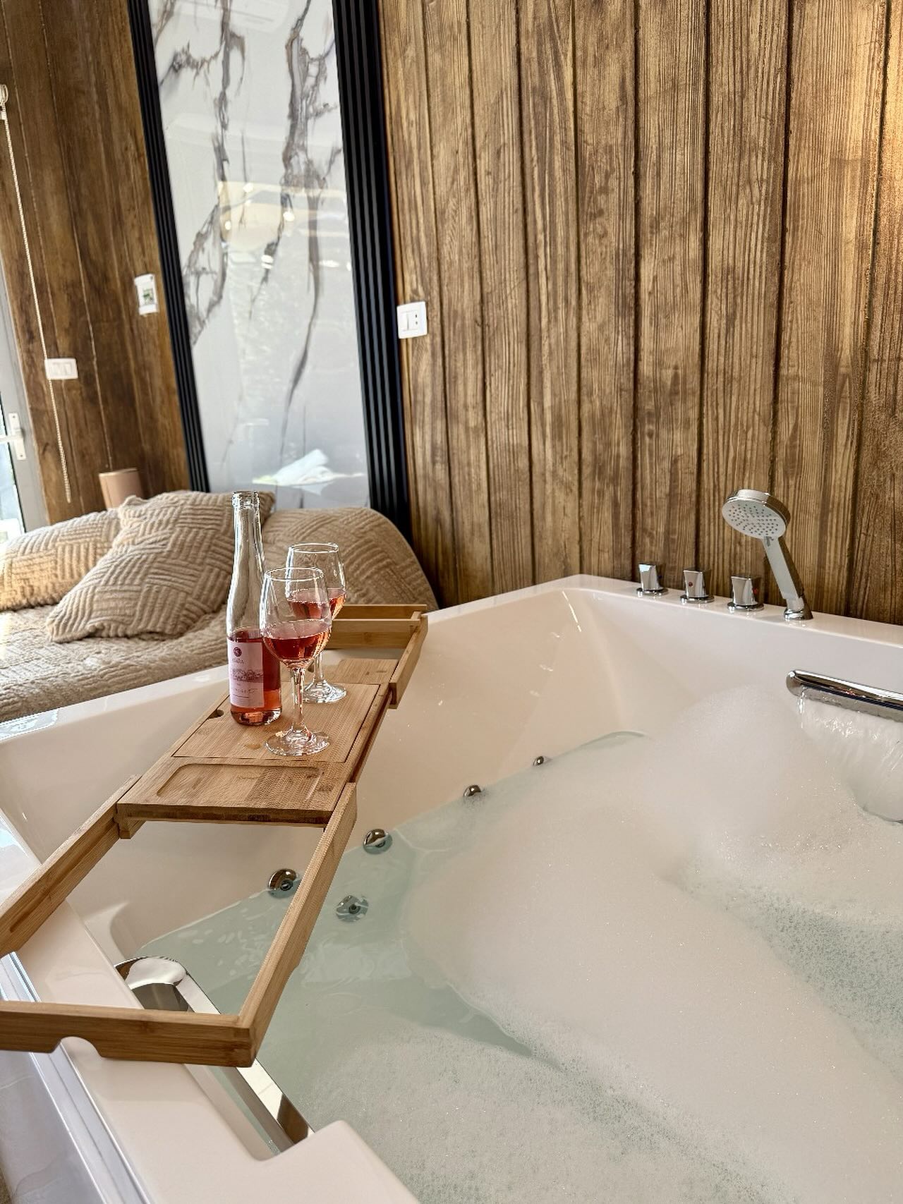 Indoor jacuzzi with wine