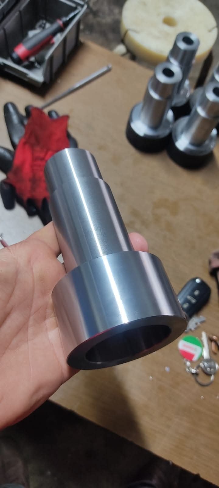 Machined parts with square center holes