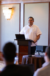 Keynote speaker at podium