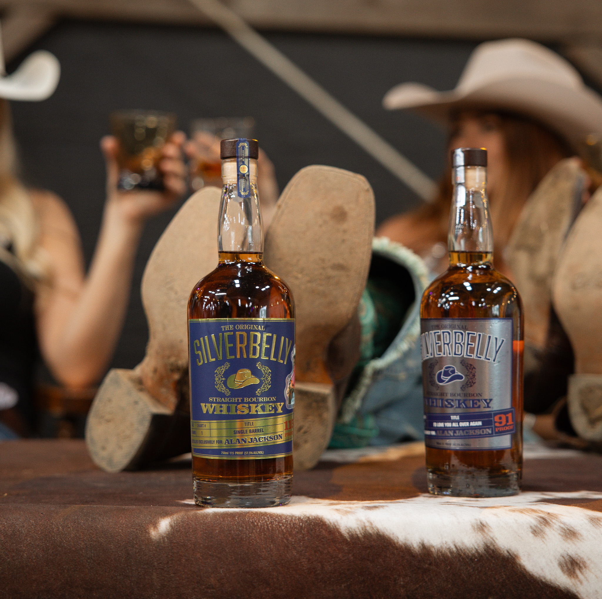 Silverbelly Whiskey bottles with cowboy boots