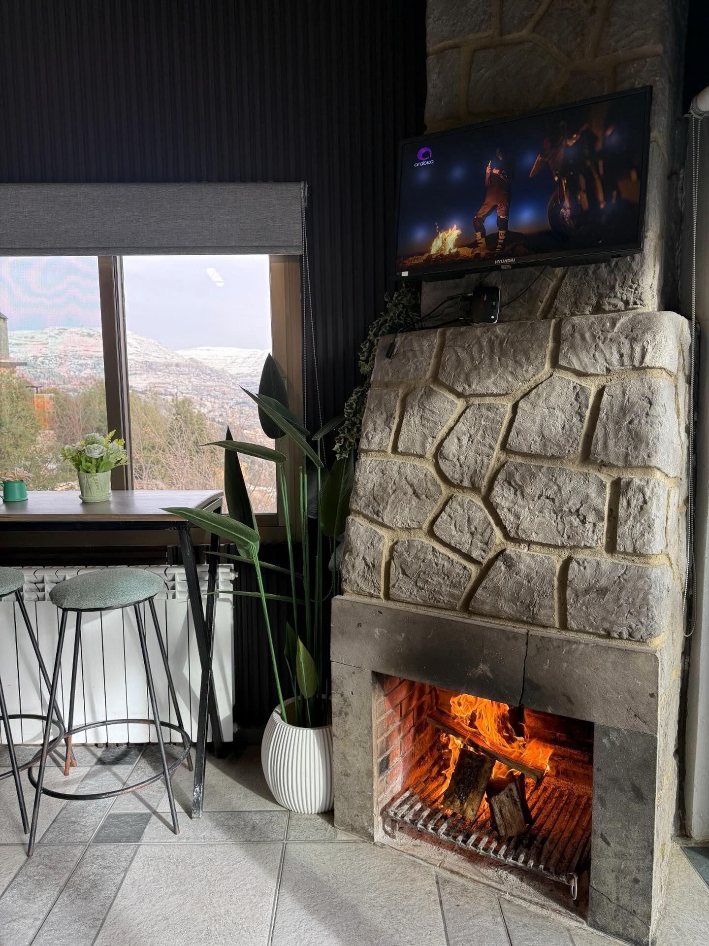 Cozy interior with wood stove and traditional breakfast