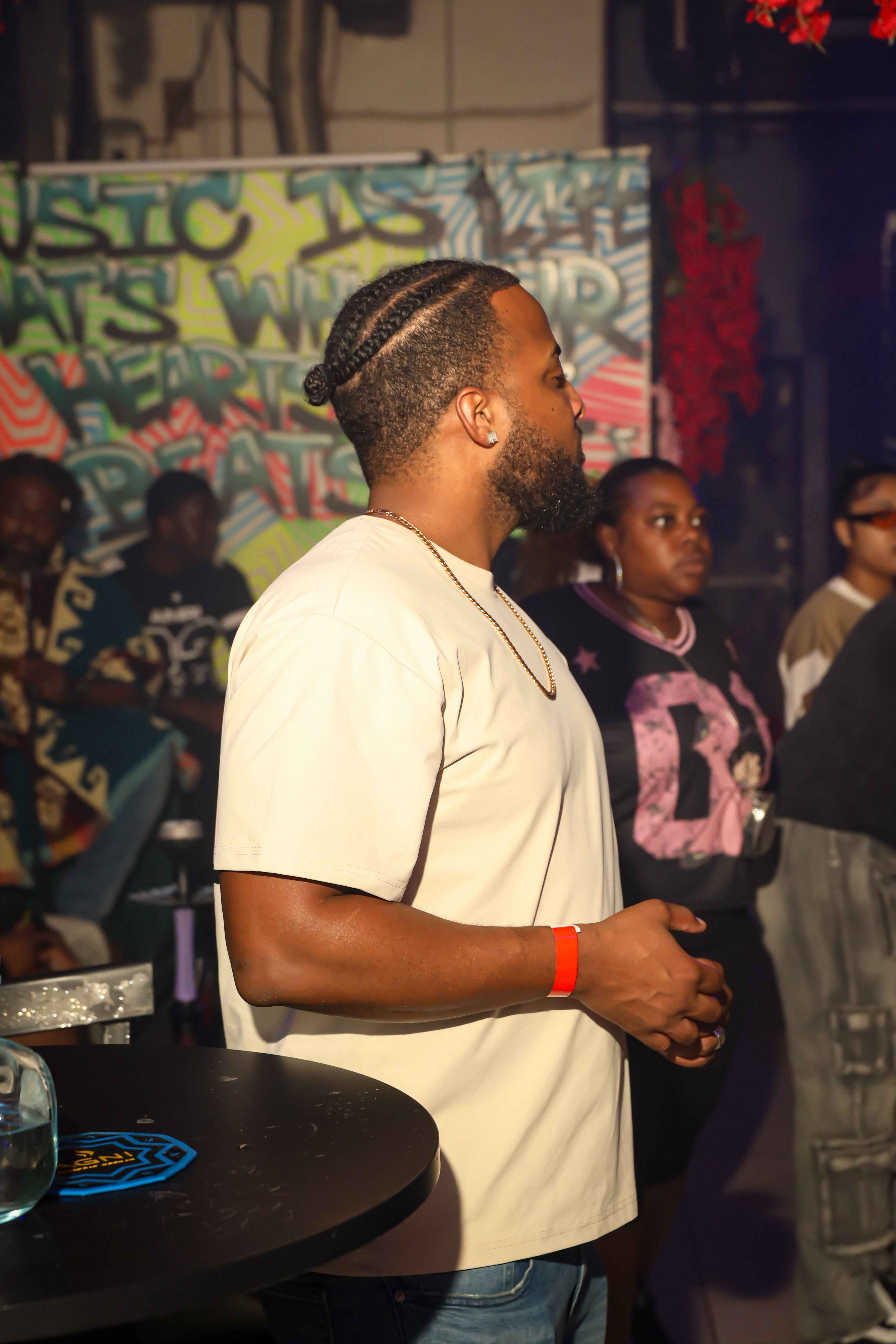 Guest enjoying atmosphere at graffiti wall