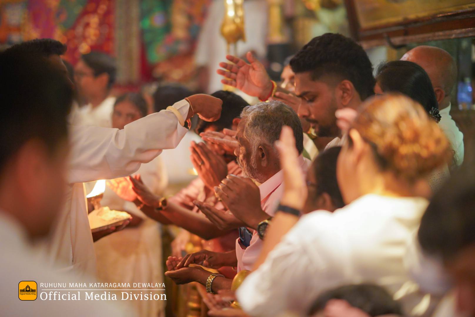 Priests blessing pilgrims