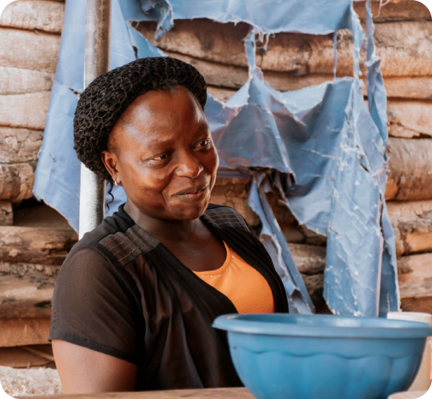 African entrepreneur with a blue bowl in her workspace