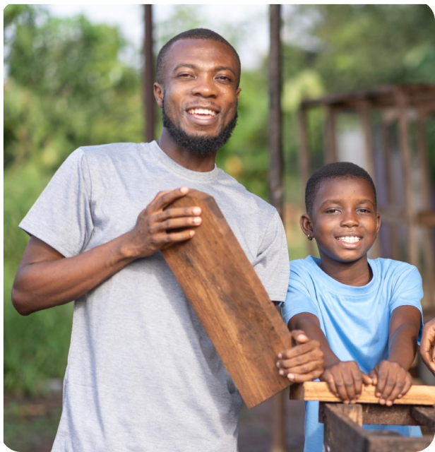 Father and son working together on a woodworking project