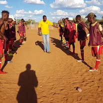 Training session with players lined up on field